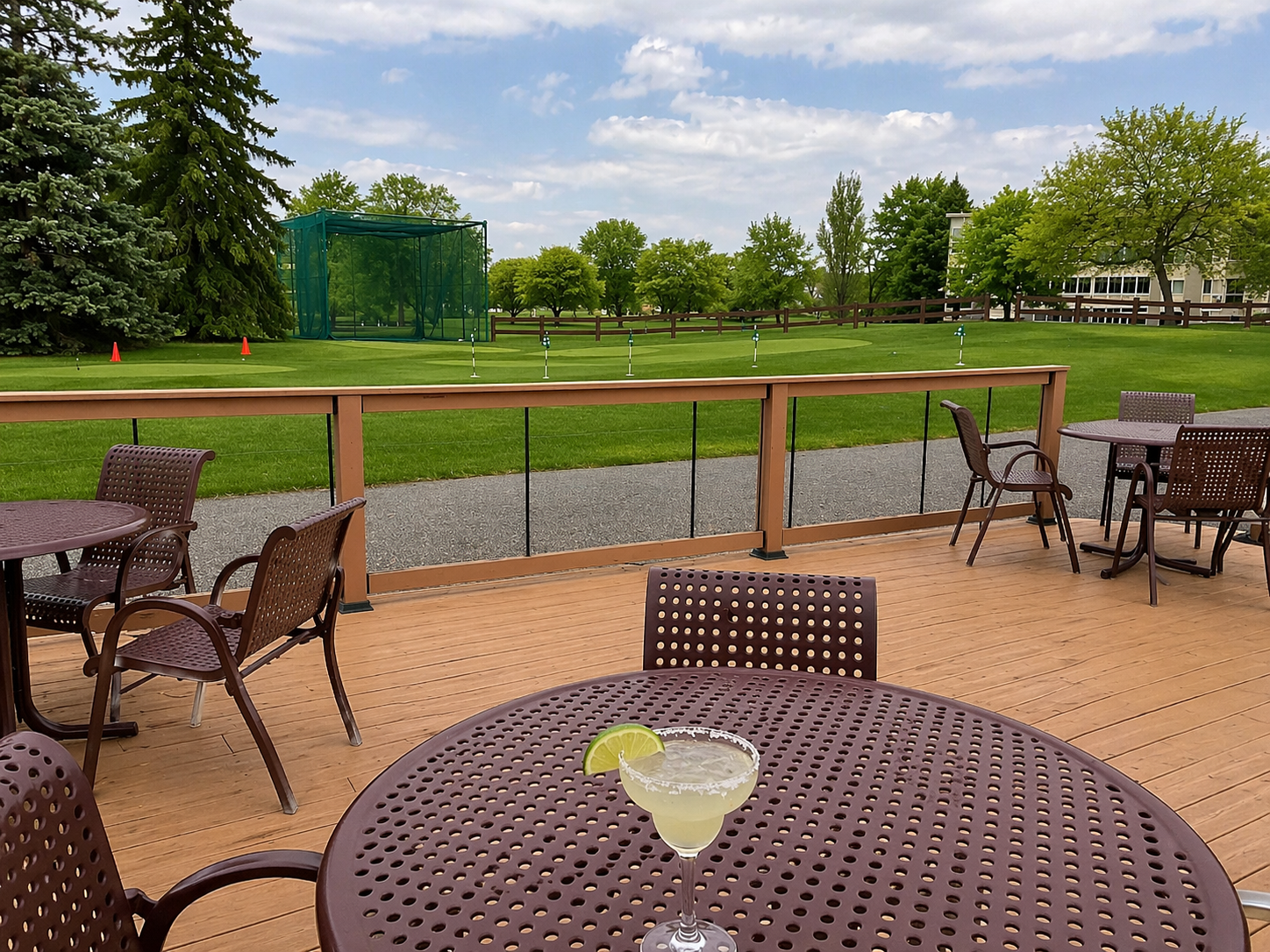 A margarita on the El Gran Jardin patio overlooking the Emerald Greens Golf Course putting green.