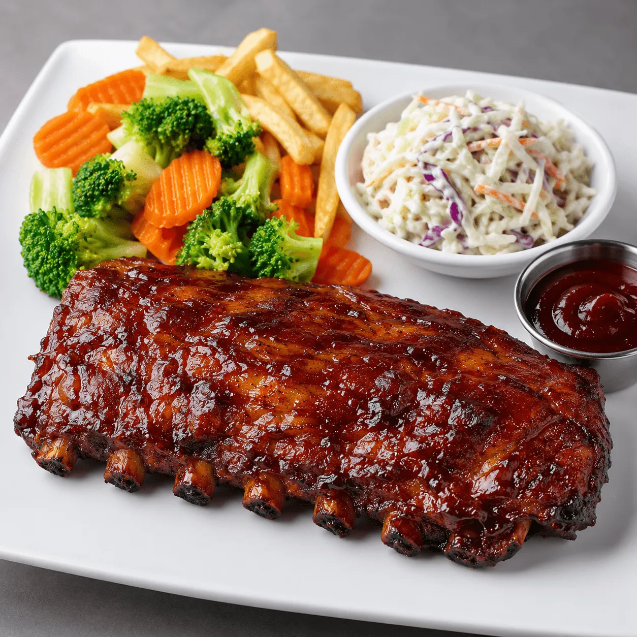 Baby Back Ribs with coleslaw and French fries