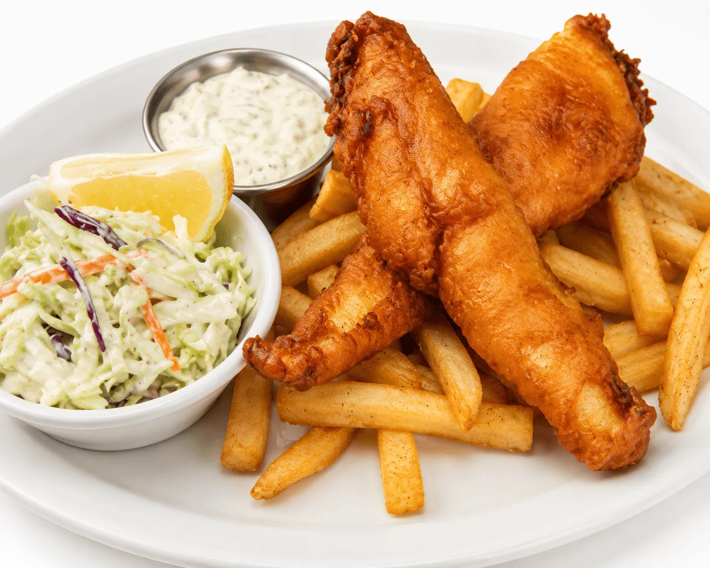 Fish and Chips — beer-battered fish with coleslaw, tartar sauce and French fries