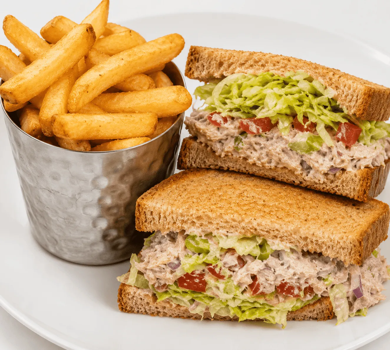 Tuna Sandwich on toasted sourdough with lettuce, tomatoes and mayonnaise